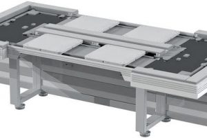 Assembly and transfer system features large work-piece holders