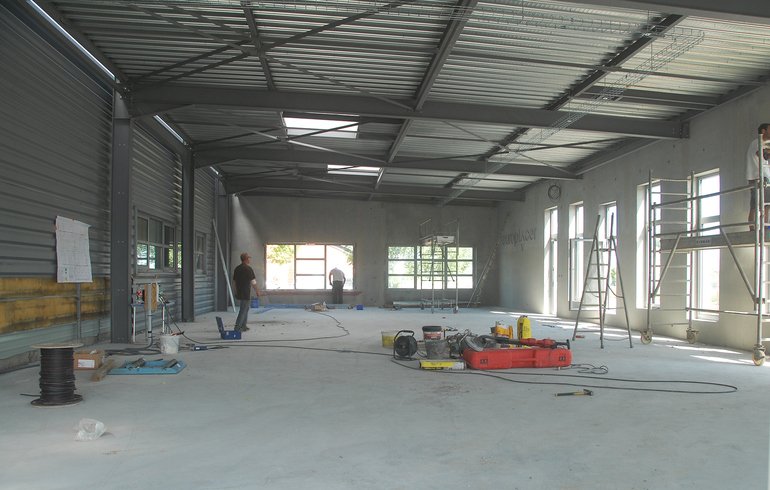 Expanding manufacturing facility with customer area in France
