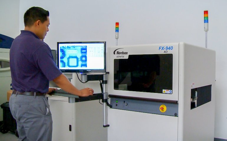 Combining conformal coating and inspection into one automated system