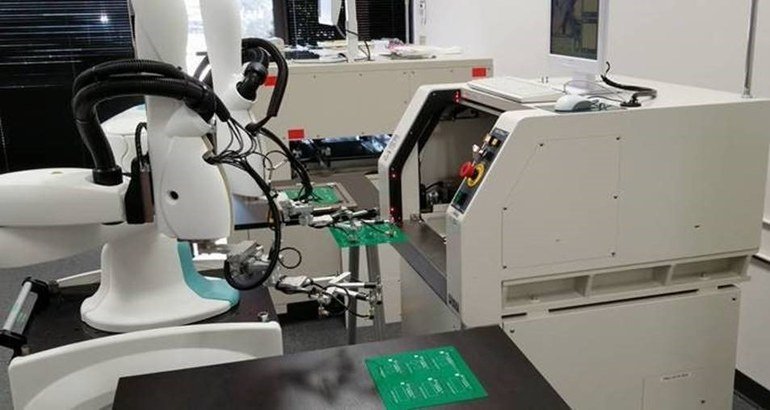Automated depaneling system with dual arm robot